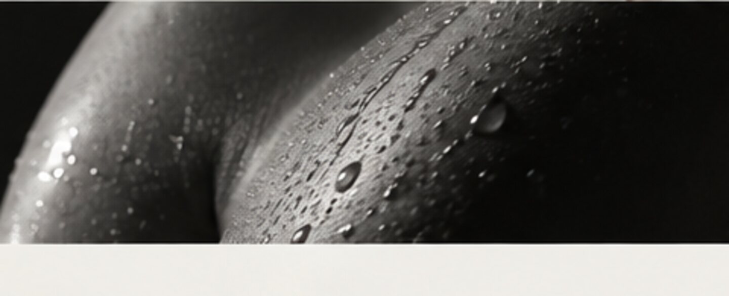 Close-up of water on skin texture in monochrome light